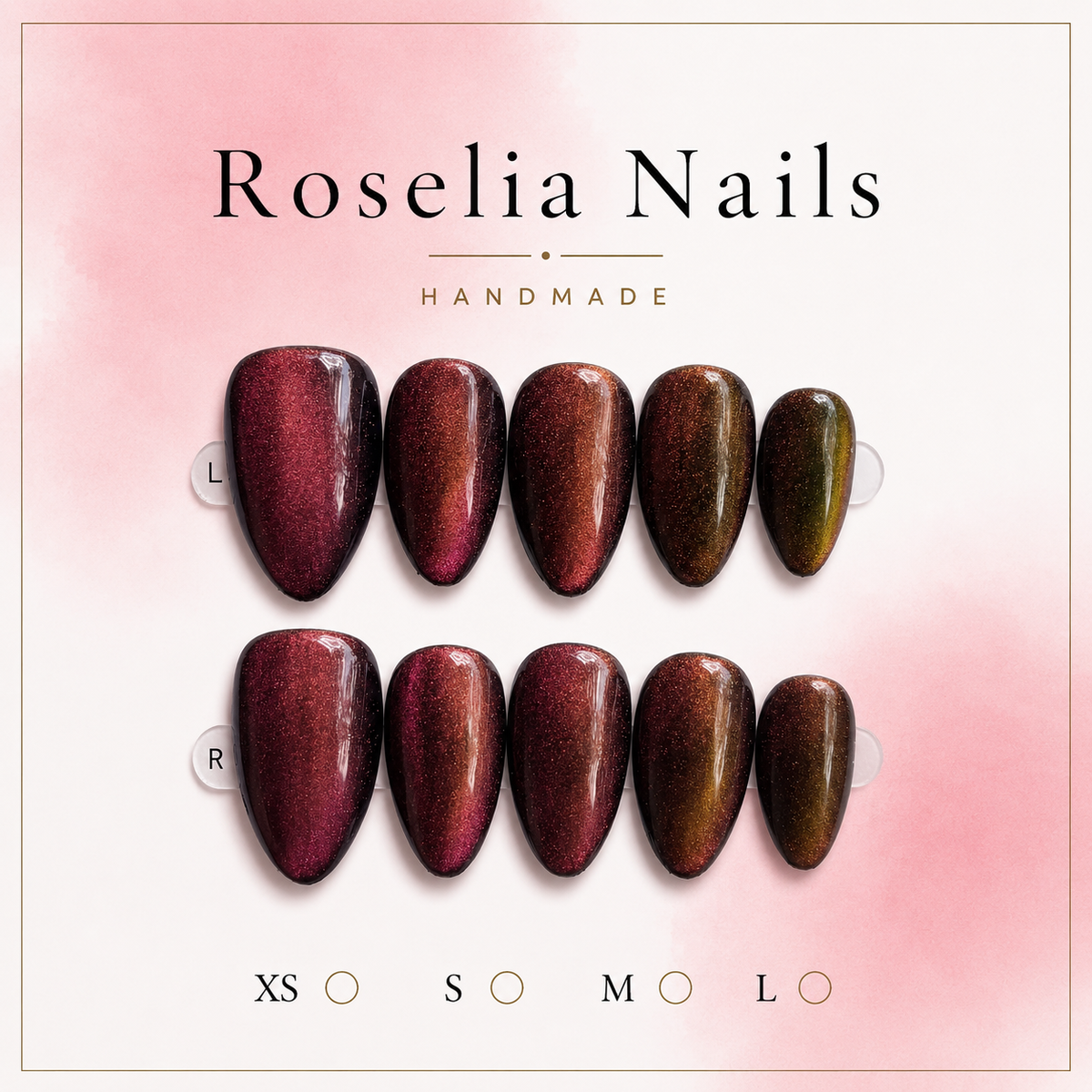 Garnet press-on nails, burgundy cat-eye shifting to bronze, long almond